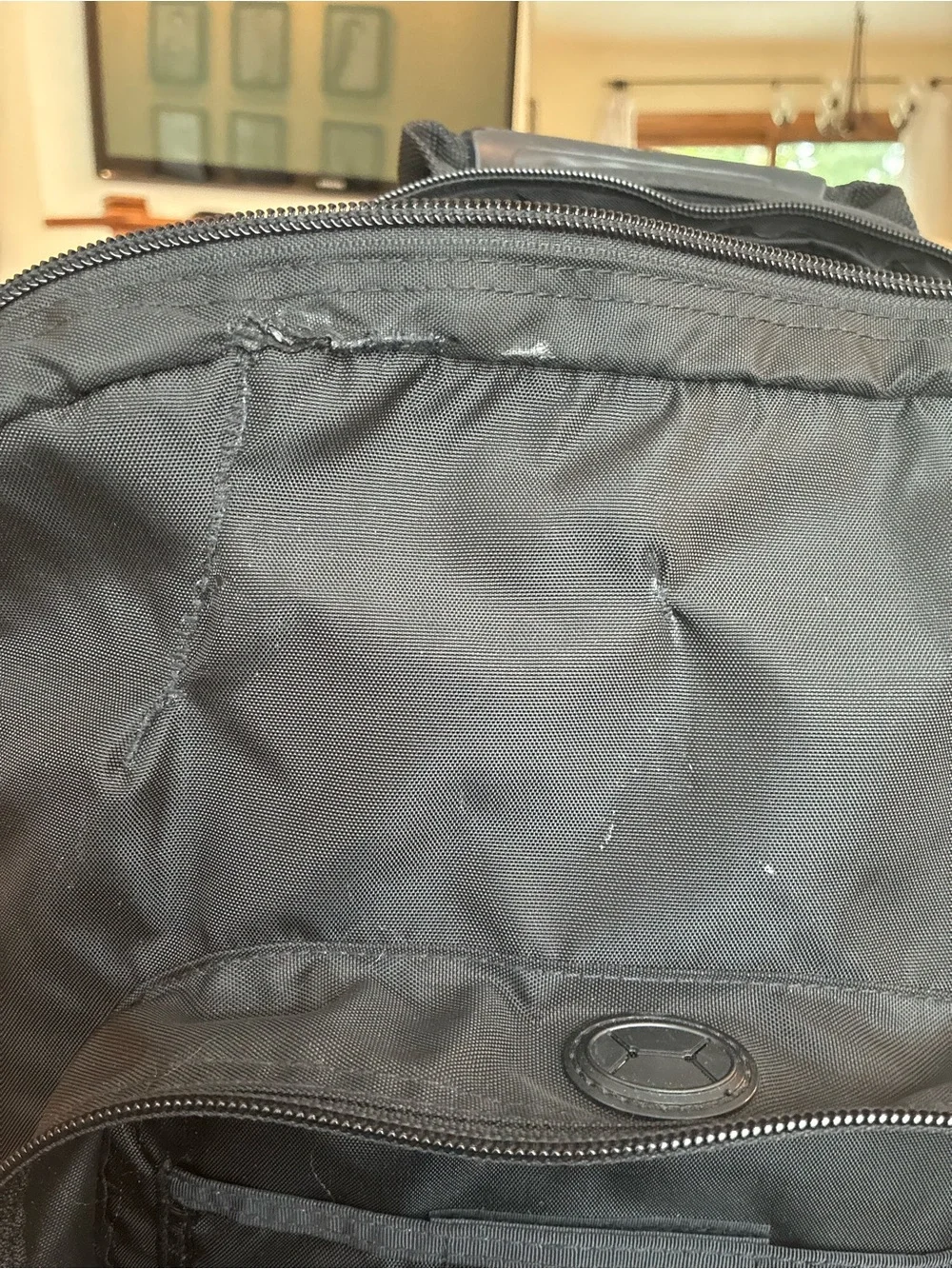 L.L. Bean Black Rolling Backpack with Silver Reflective Accent